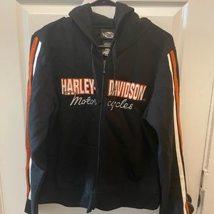Real fit size of L Harley Davidson jacket.